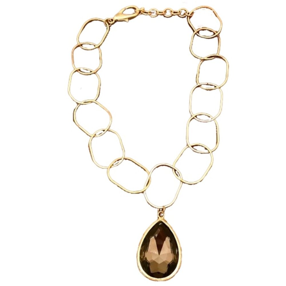 Beautiful matte gold necklace with faceted stone